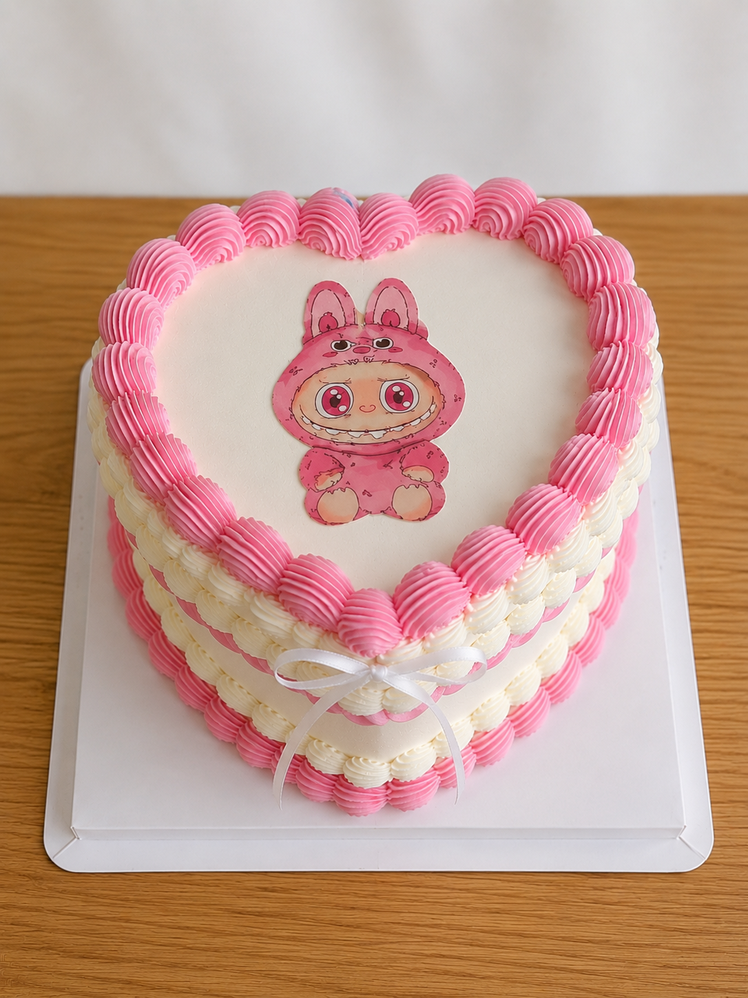 Gâteau d'anniversaire personnalisé à l'éfigie de votre mascotte (pour 10 personnes)